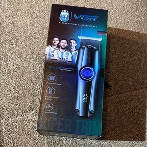 Professional Hair Trimmer - Silver and Blue (used once). USB charging